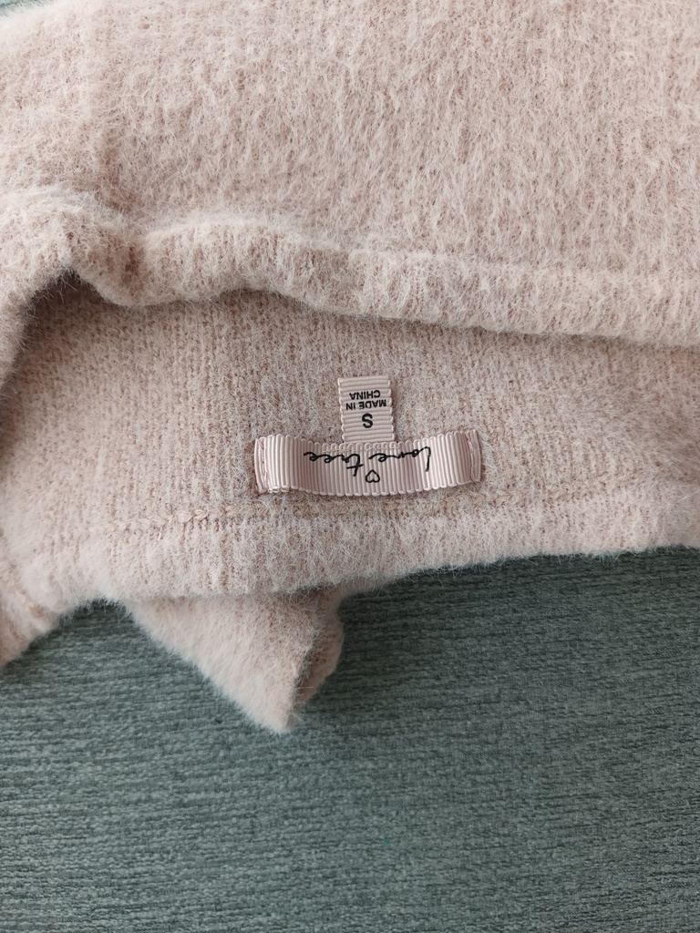 Blusa de peluche rosa