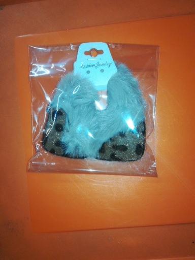 cola de peluche